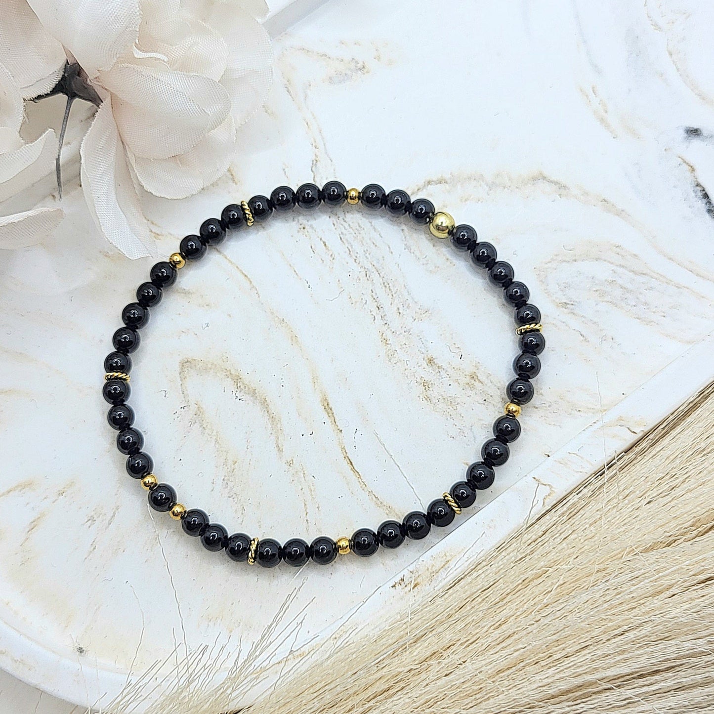 Armband Onyx vergoldet (4mm)