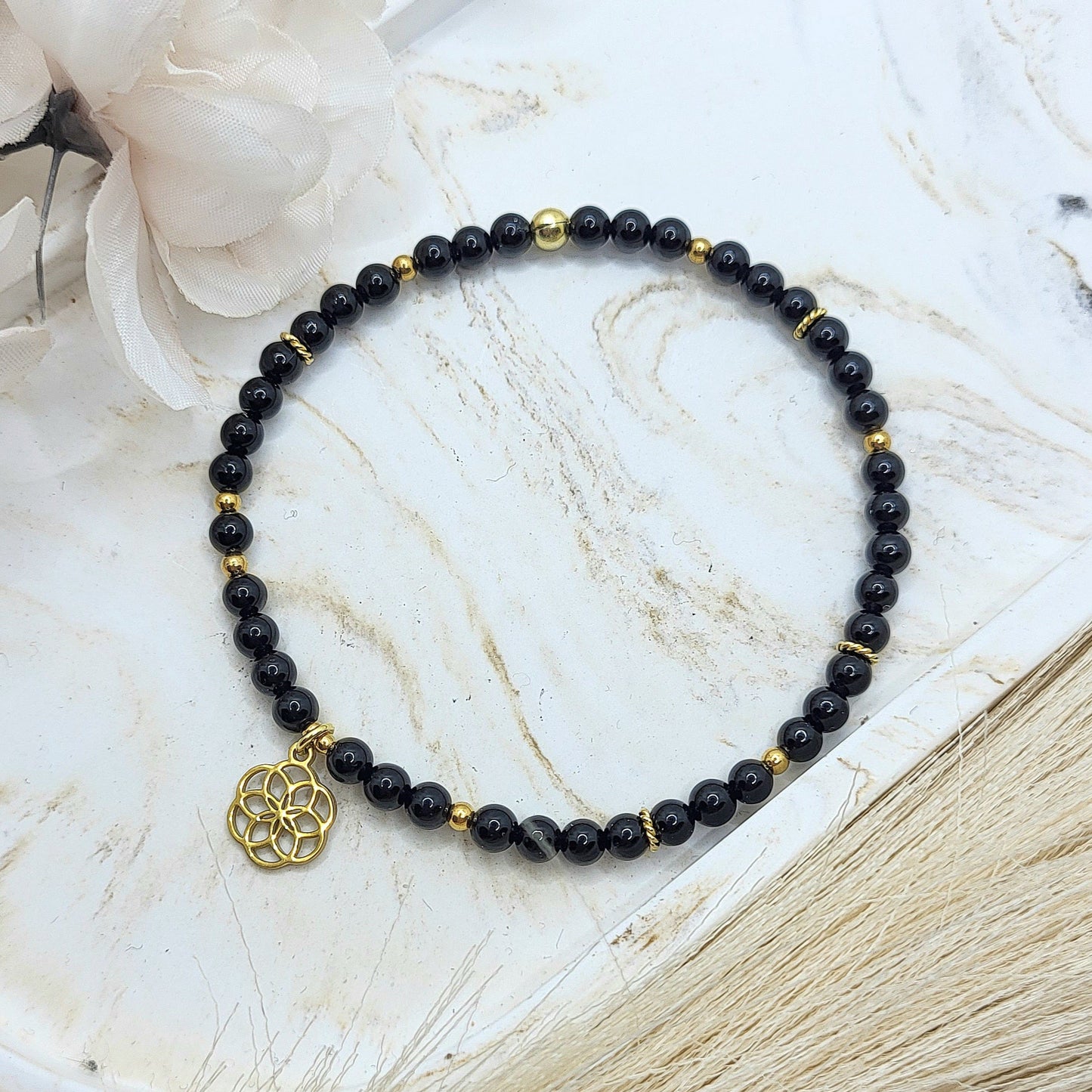 Armband Onyx vergoldet (4mm)